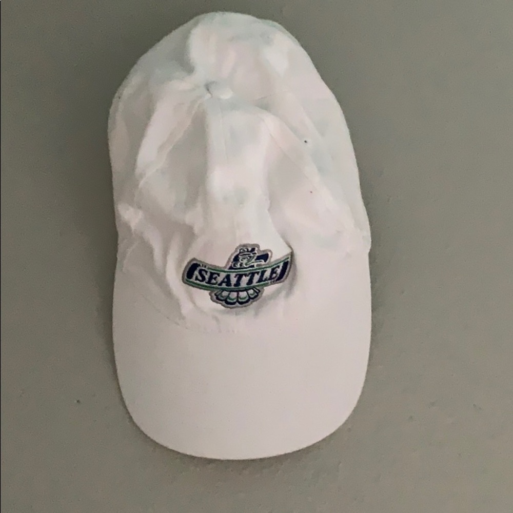A Seattle Thunderbirds white hockey hat.